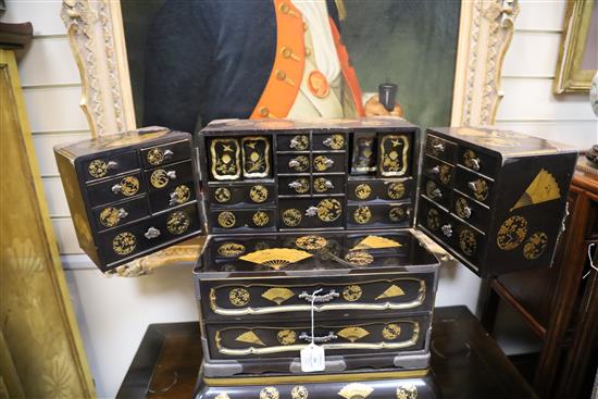 A good Japanese silver mounted gold lacquered table cabinet, Meiji period, H. 53cm, W. 43cm, minor faults